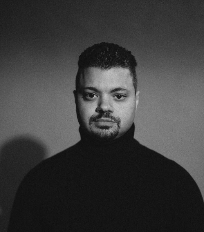 Portrait of Seif Abdalla in a black turtleneck.